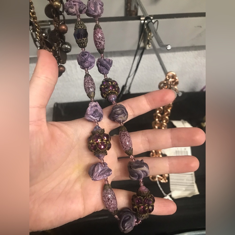 Live show listing purple necklace